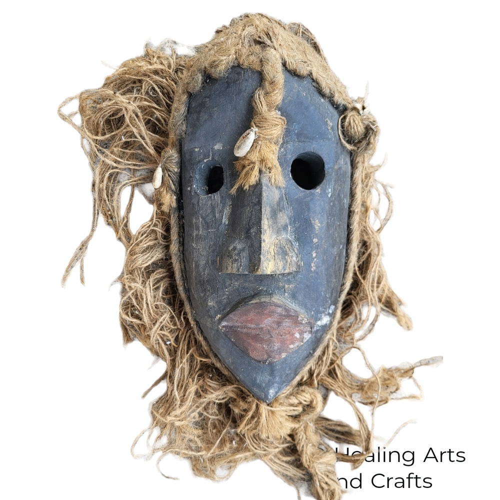 Handcrafted Tribal Mask with Natural Fibers